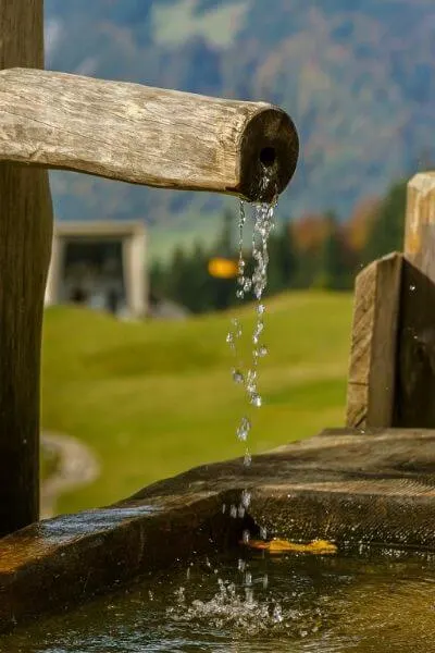 Water dripping water into a trough