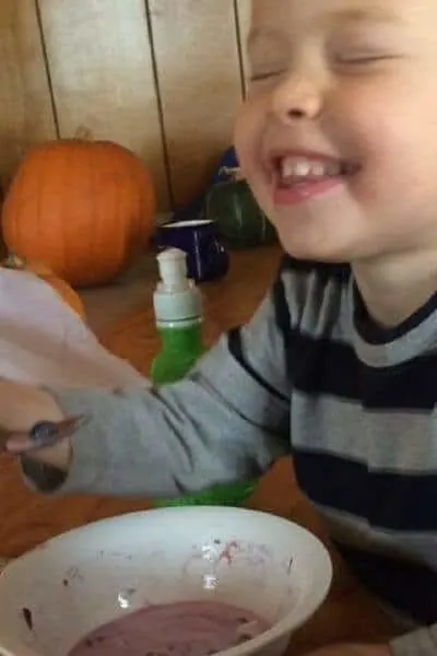 3-year-old eating homemade goat yogurt